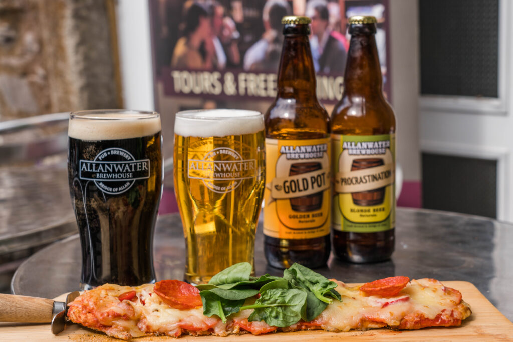 Pints, bottle and pizza