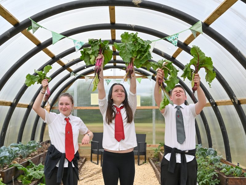 School children from Braes High in Polmont who have worked with the Forth Environment Link on their Young Good Food Ambassadors project. The project included funding for a poly tunnel which has enabled kids to grow a substantial amount of fresh produce. L-r are Inarra Thomson, Melissa Whiteside and Jayden Stewart.