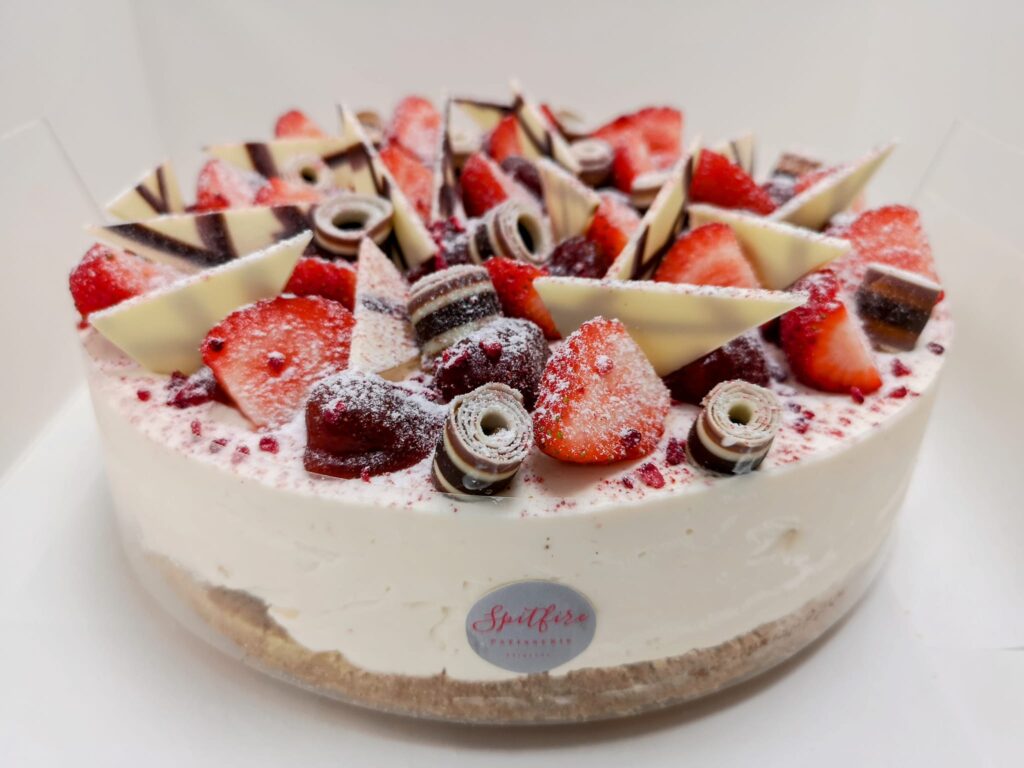 cake topped with fruit and chocolate