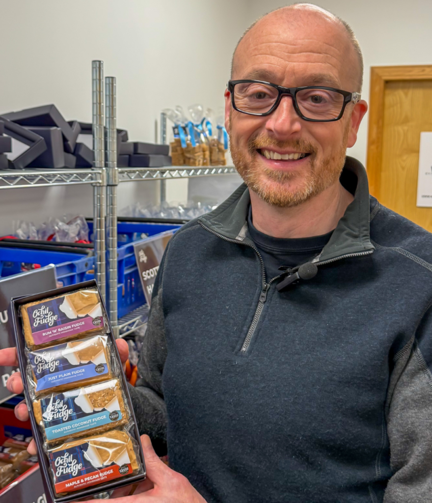 Graeme holding one the display boxes
