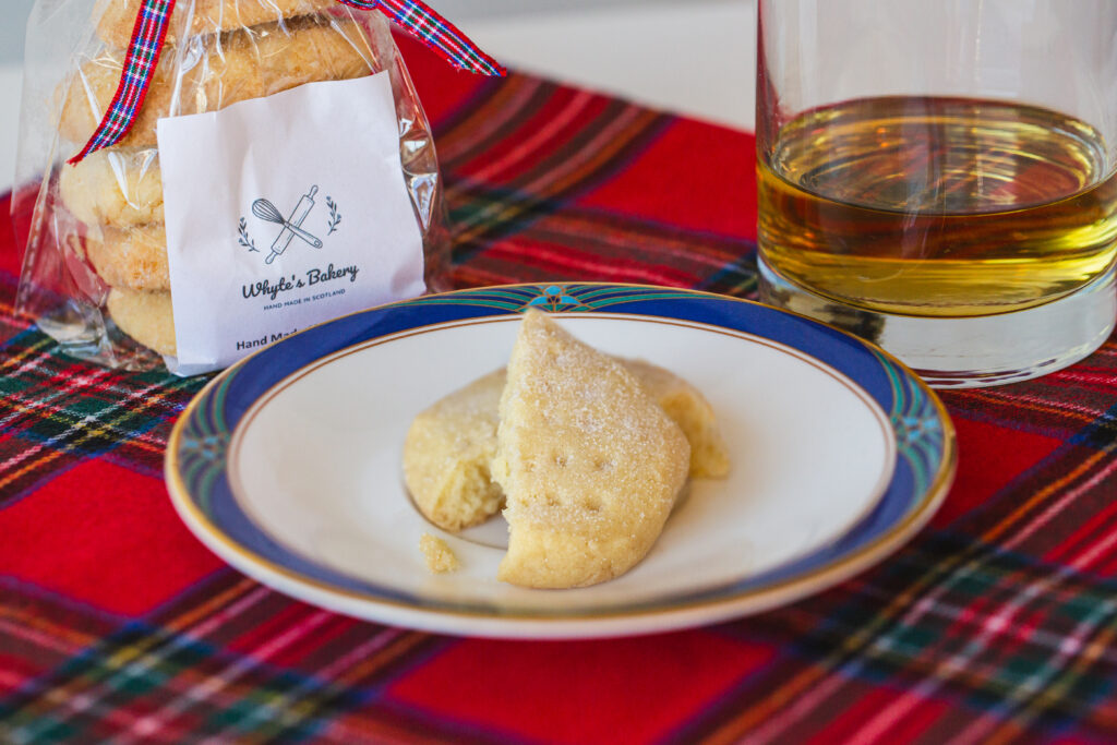 Shortbread on a plate with tartan tablecloth