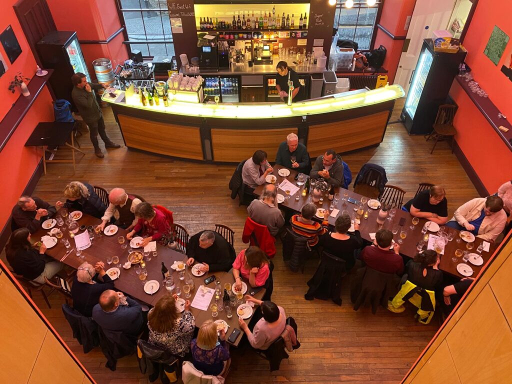 Top down view of tables laid out for tolbooth supper club