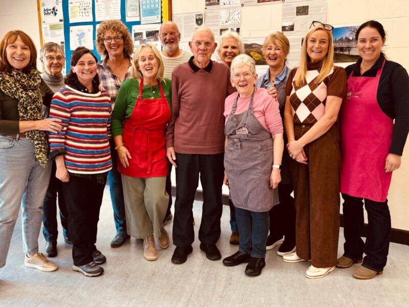The Village kitchen team smiling for the camera
